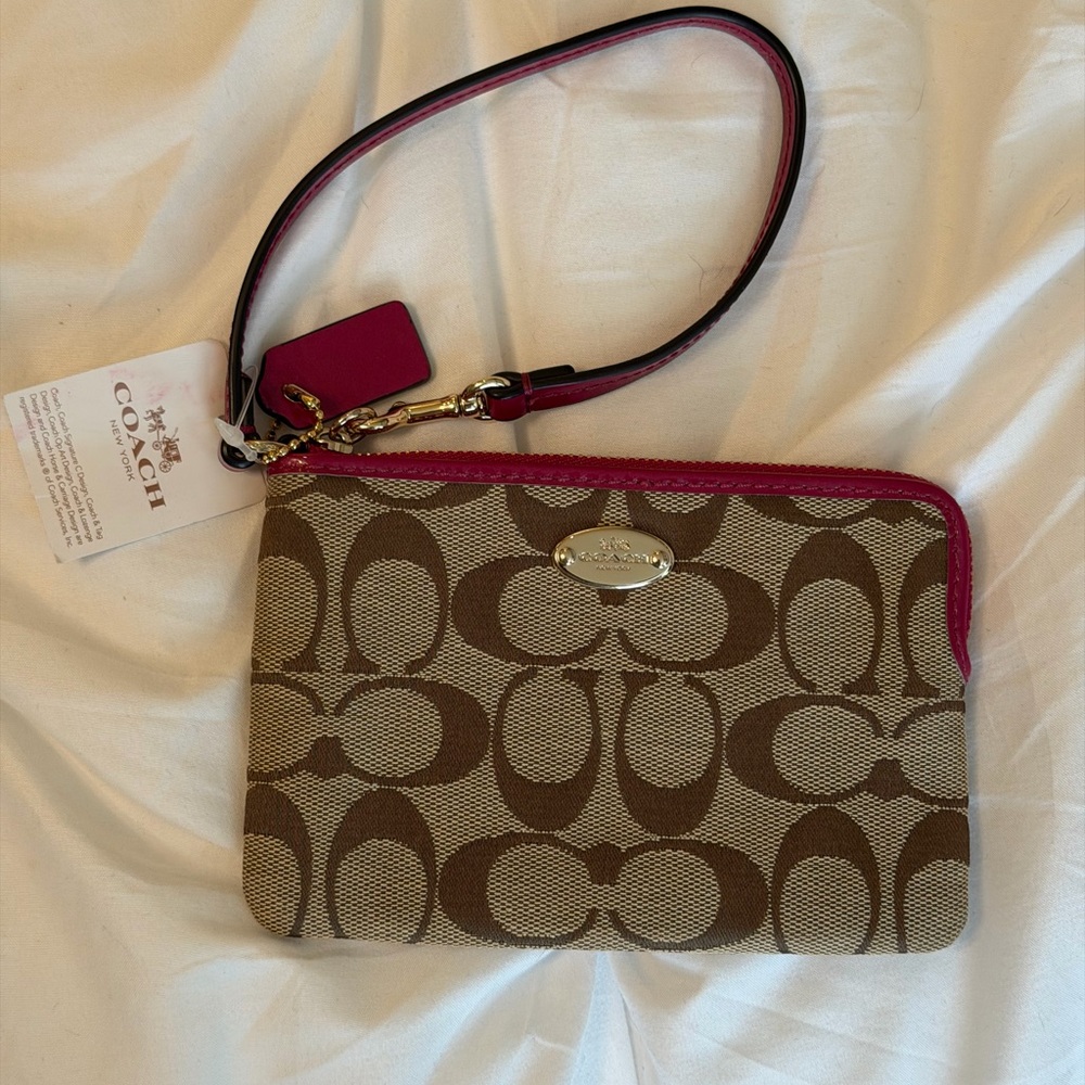 Coach Brown Signature Canvas Wristlet with Pink Trim